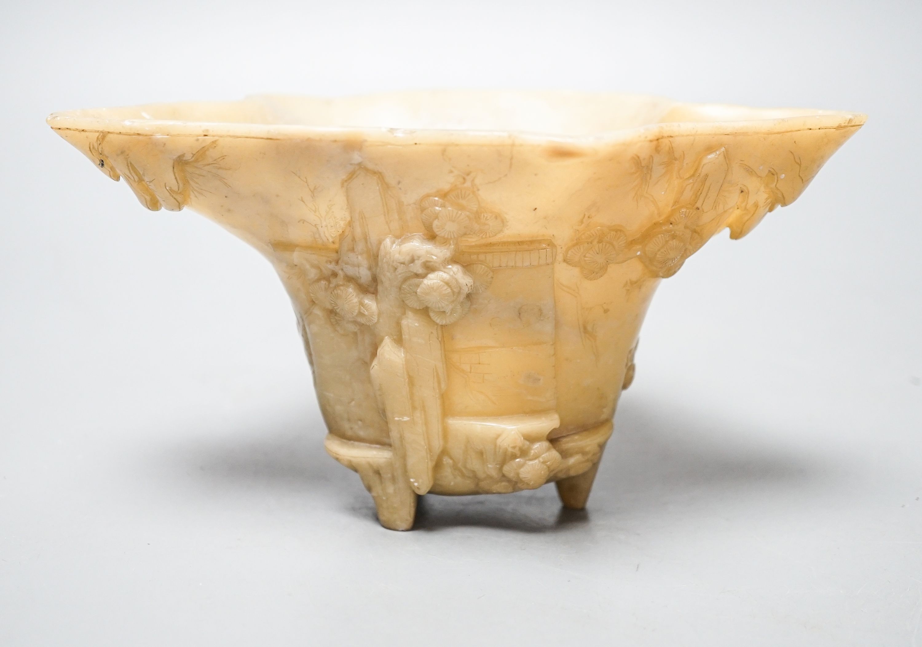 A Chinese carved soapstone libation cup, 19cm